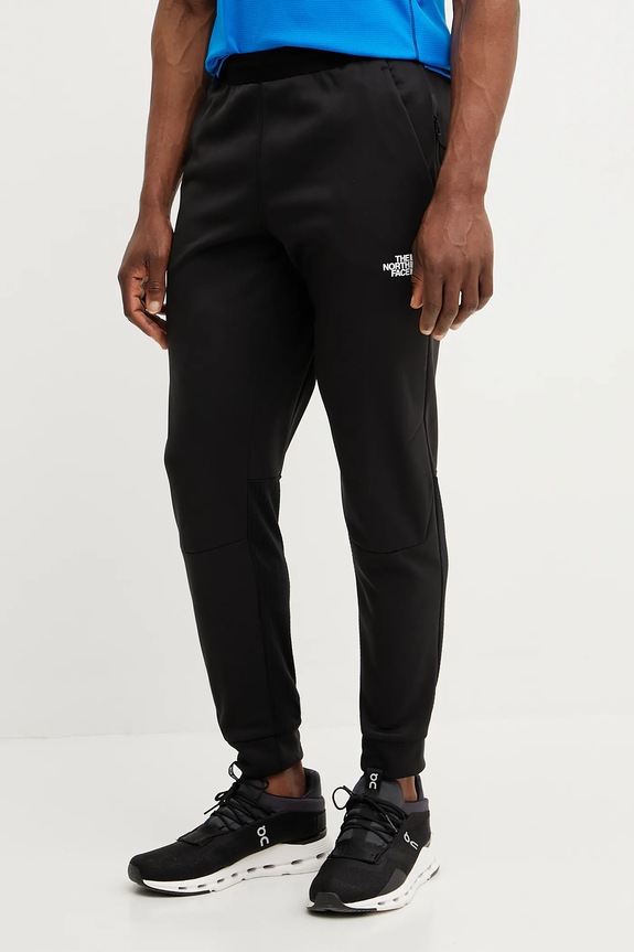 The North Face spodnie Mountain Athletics Fleece dzianina czarny NF0A893SJK31