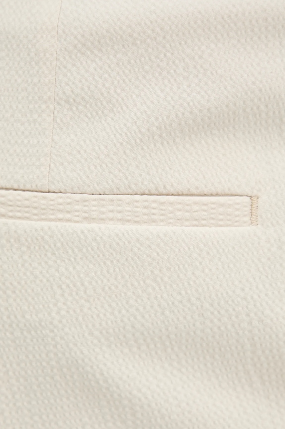 Calvin Klein spodnie beżowy K10K113936