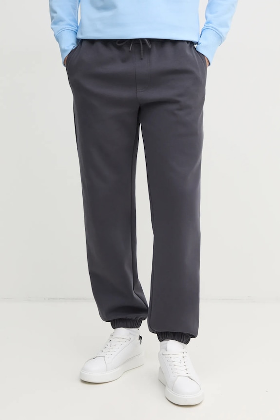 Tepláky Calvin Klein Jeans pletenina sivá J30J327241