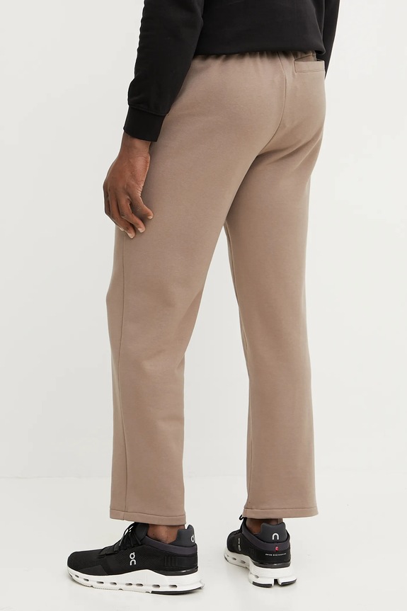 Odzież Puma spodnie dresowe bawełniane 629651 brązowy