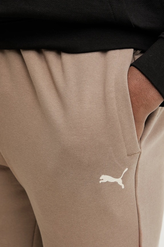 Puma spodnie dresowe bawełniane brązowy 629651