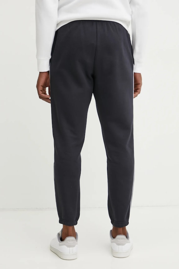 Odzież Under Armour spodnie dresowe Project Rock 1389917 czarny