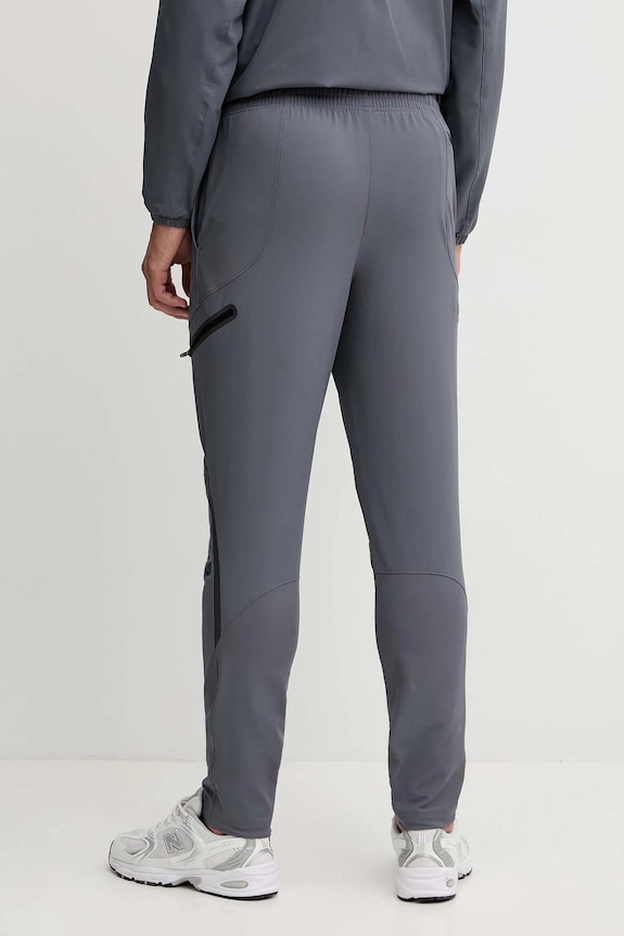 Ρούχα Παντελόνι φόρμας Under Armour Unstoppable 1390256 γκρί