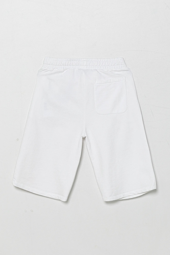 Detské bavlnené šortky Guess L5GD06.KA6R4.PPYA biela SS25