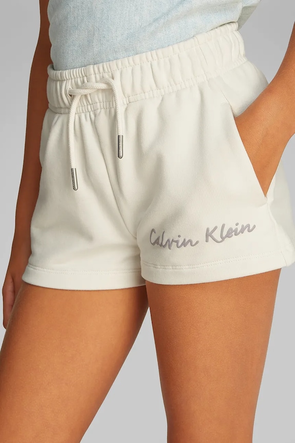 Detské krátke nohavice Calvin Klein Jeans IG0IG02882.128.176.PPYA béžová