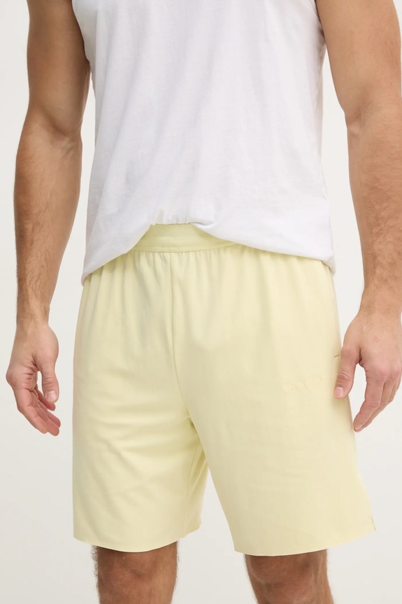Tréningové šortky Calvin Klein Performance s elastanom žltá LVGMS5S850