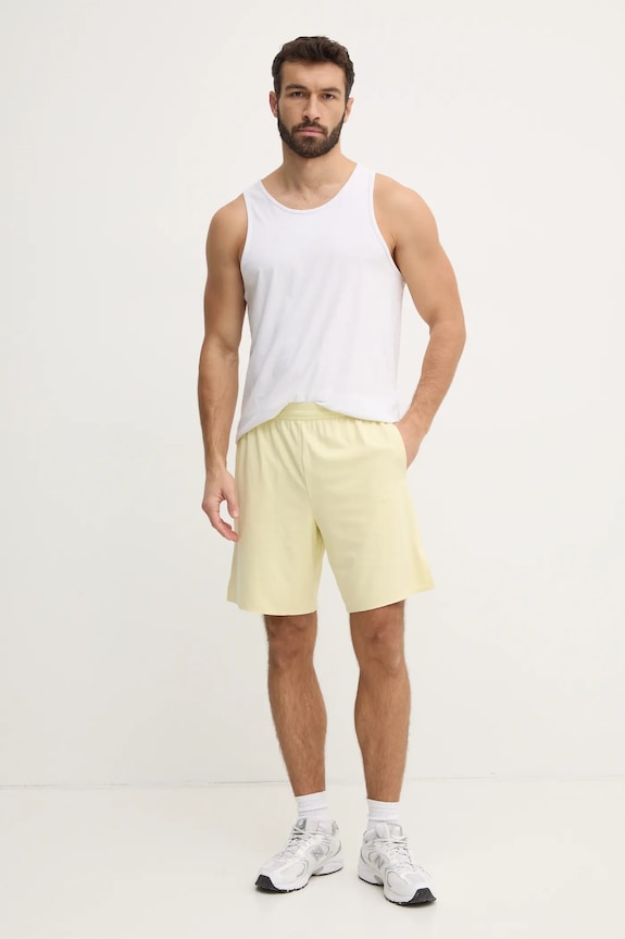 Tréningové šortky Calvin Klein Performance LVGMS5S850 žltá SS25