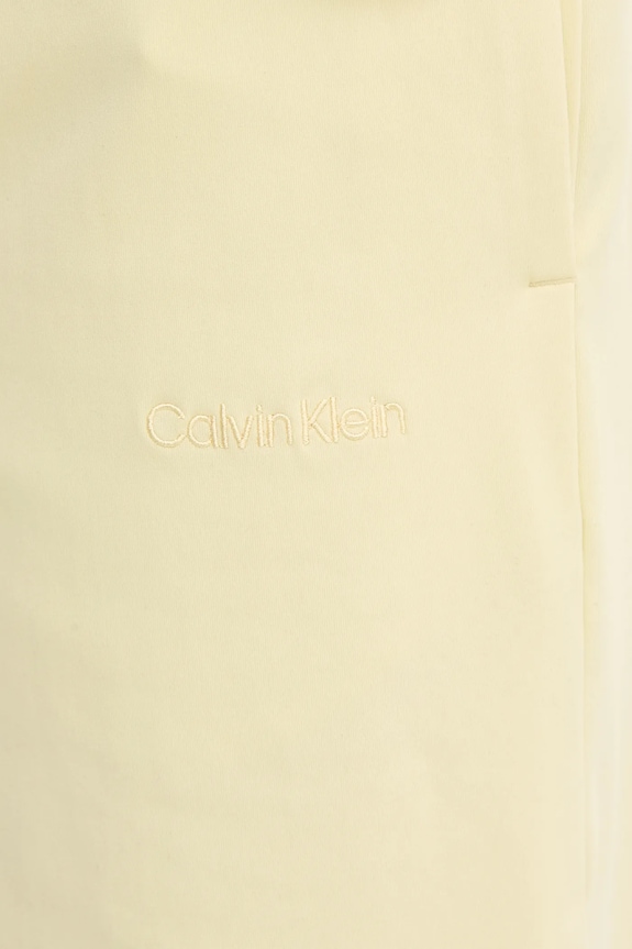 Tréningové šortky Calvin Klein Performance žltá LVGMS5S850