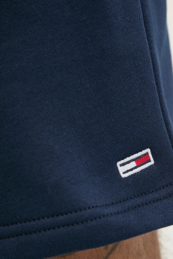 Tommy Jeans teplákové šortky pánske s bavlnou tmavomodrá DM0DM21931