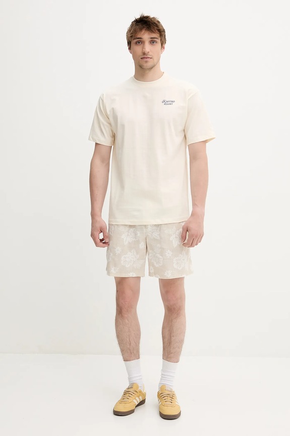 Pamučne kratke hlače Tommy Jeans DM0DM21947 bež SS25