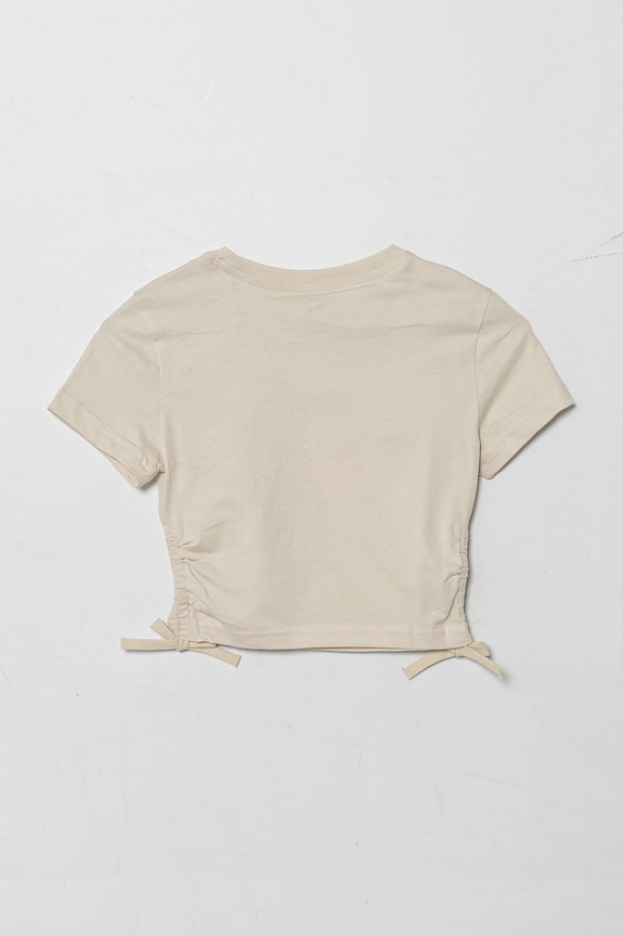 Detské bavlnené tričko Puma FLAMING LOVE Knotted Tee 685108.G béžová SS25