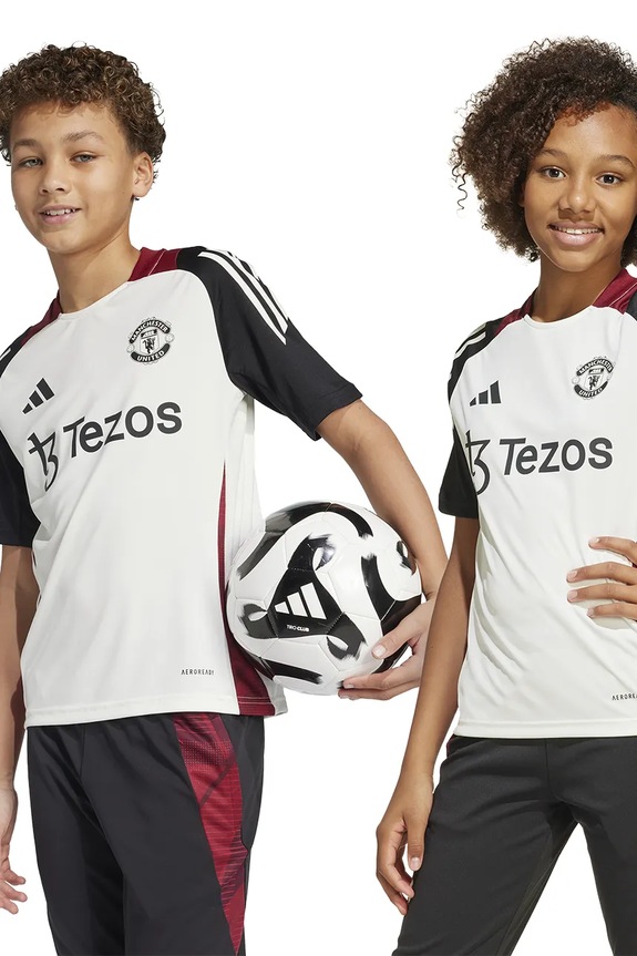 adidas Performance t-shirt dziecięcy MUFC wzorzyste beżowy JE3728