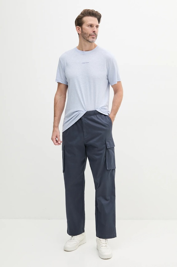 Tričko s prímesou ľanu Calvin Klein KM0KM01138 modrá SS25