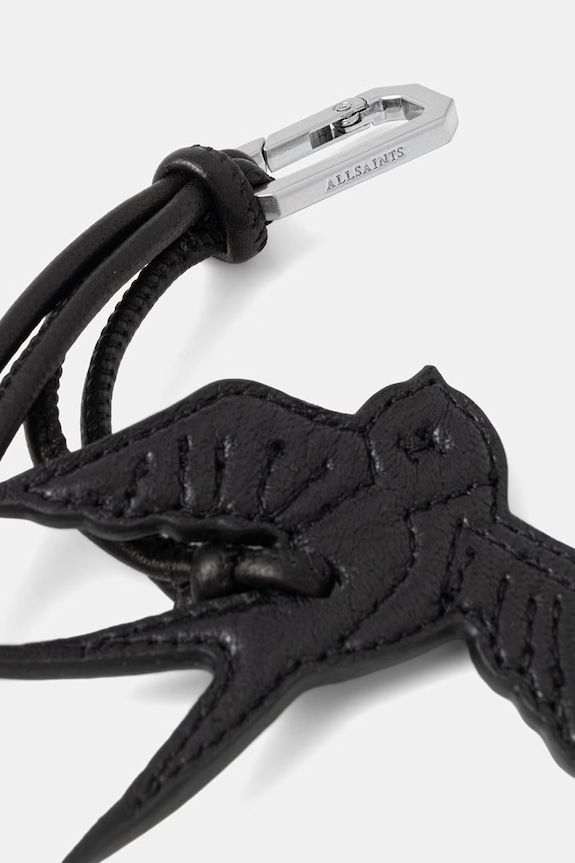 Kožni privjesak AllSaints SWALLOW W127XE crna SS26