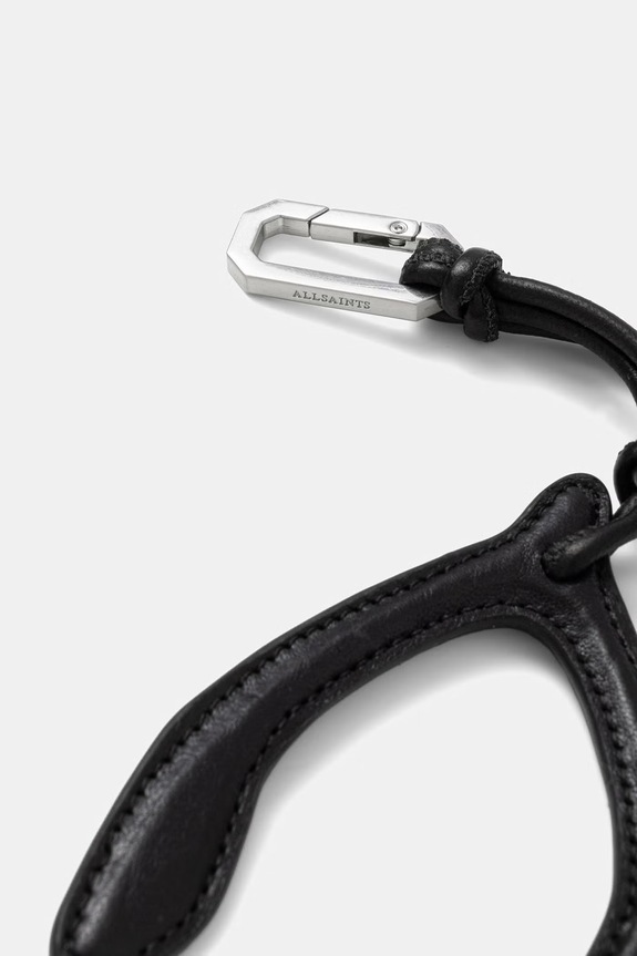 Kožni privjesak AllSaints WISHBONE W129XE crna SS26