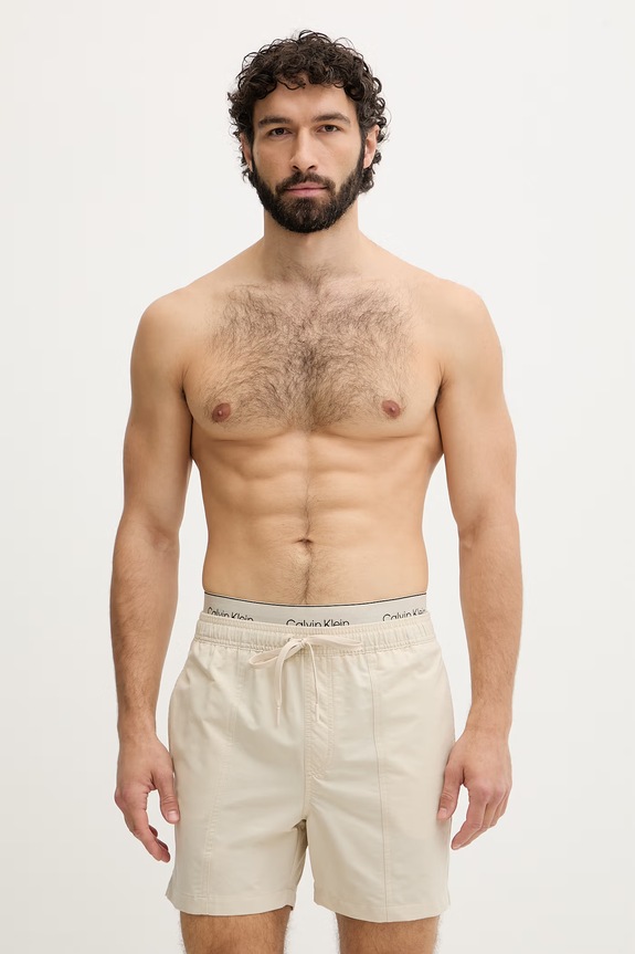 Calvin Klein plavecké šortky pánske béžová LV00N61017