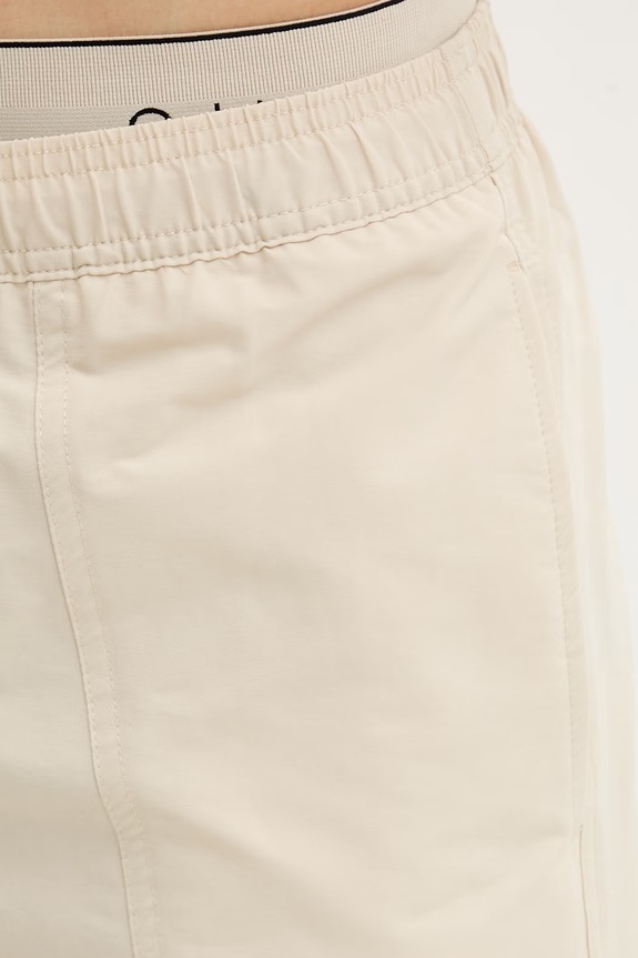 Calvin Klein plavecké šortky pánske béžová LV00N61017