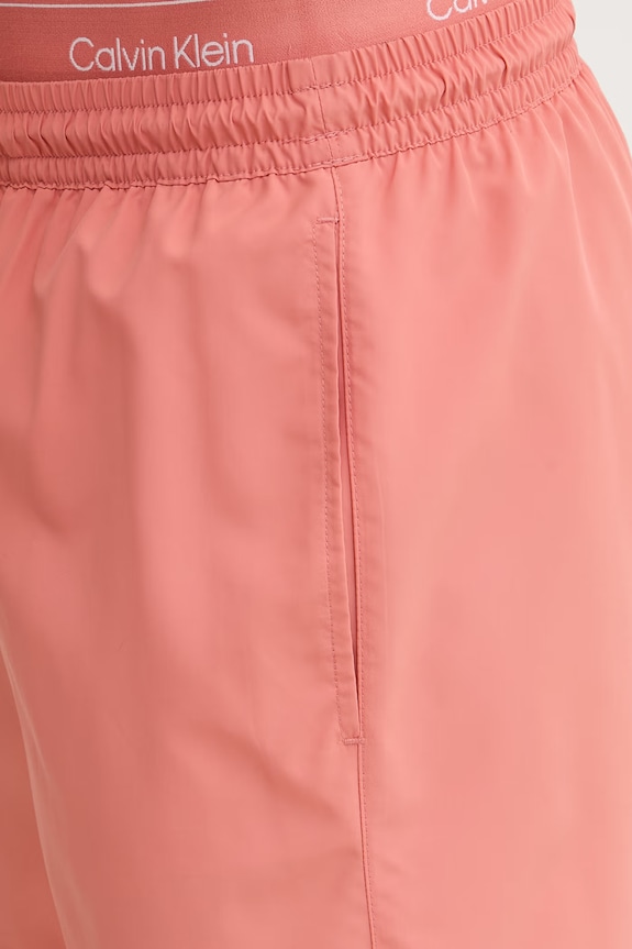 Calvin Klein plavecké šortky pánske oranžová LV00N61023
