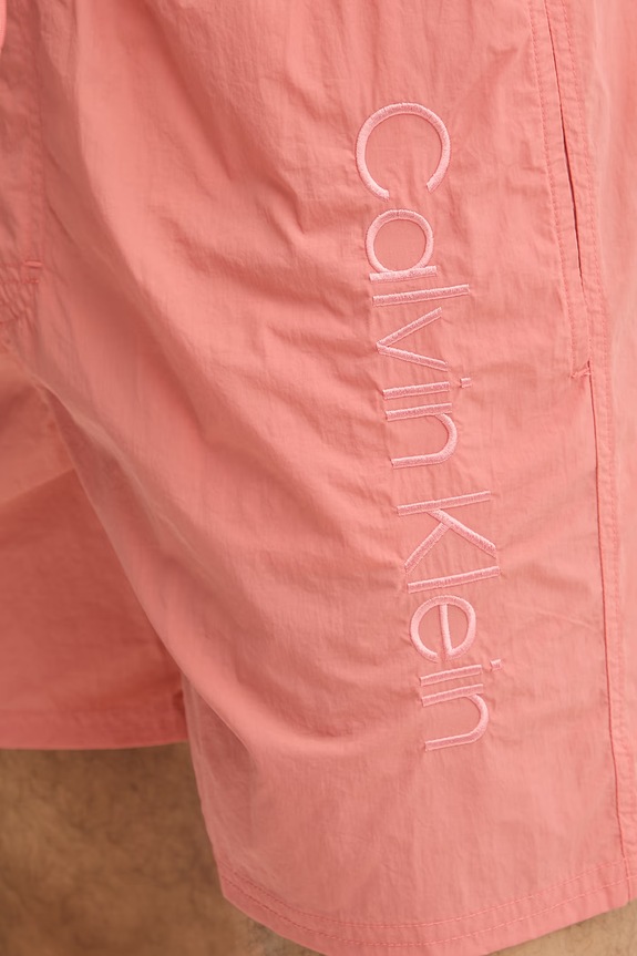 Calvin Klein plavecké šortky pánske oranžová LV00N61029