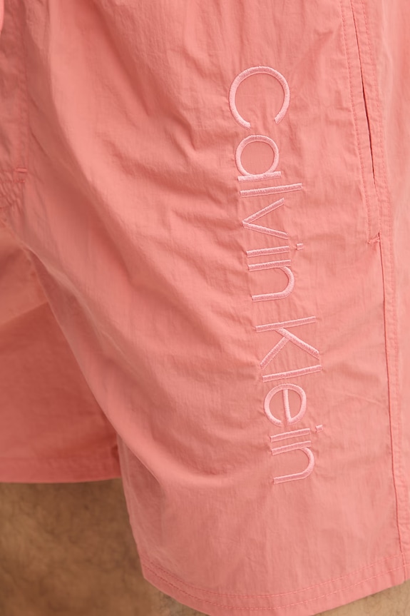 Calvin Klein plavecké šortky pánske oranžová LV00N61029