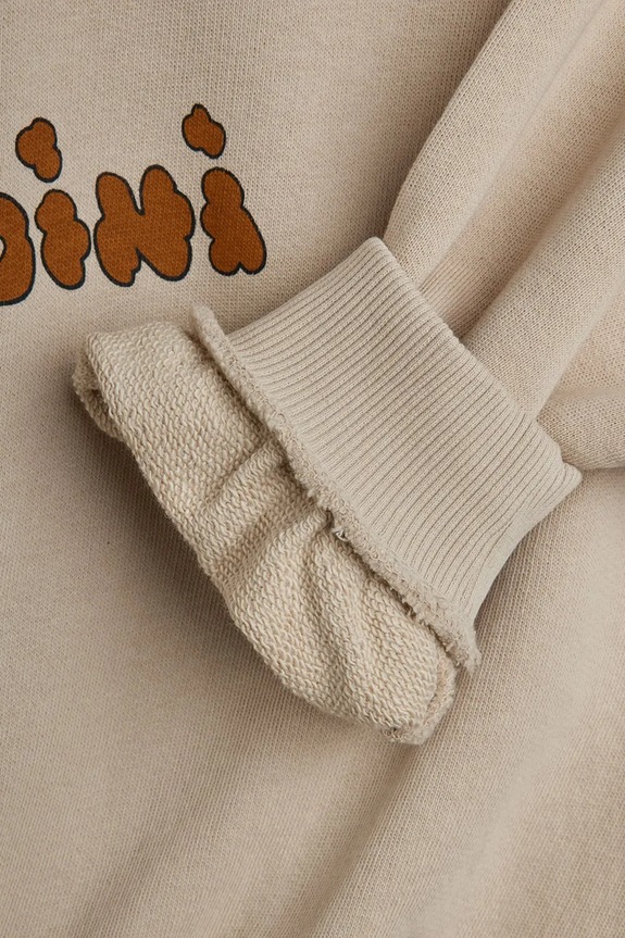 Παιδική βαμβακερή μπλούζα Mini Rodini Doggies 26120125 μπεζ