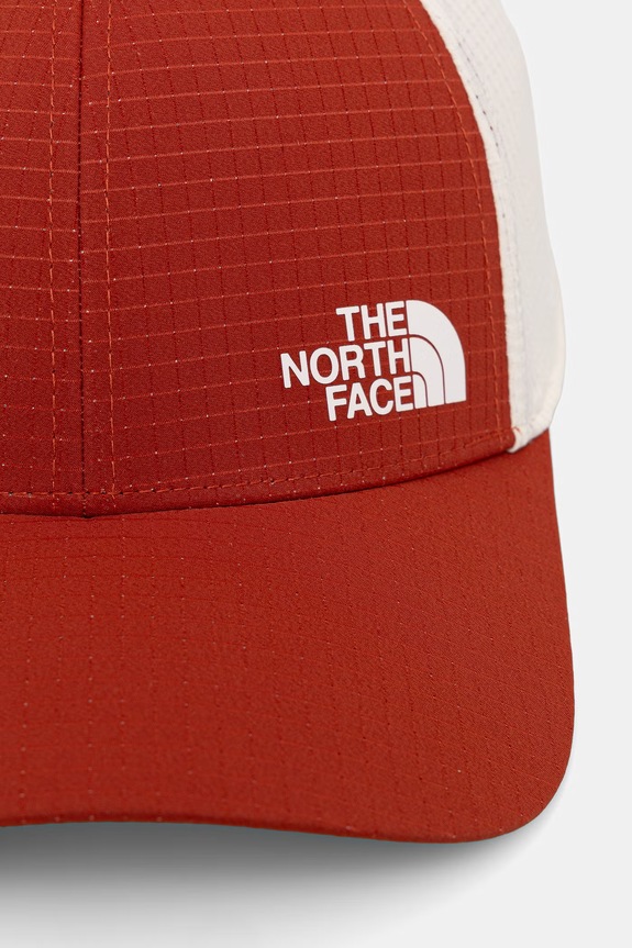 The North Face καπέλο με γείσο TRUCKER NF0A8A2ENI61 πορτοκαλί SS26