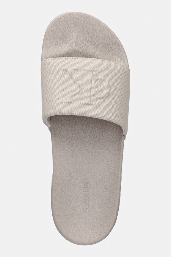 Calvin Klein klapki męskie ESS SLIDE HF MONOGRAM CV beżowy HM0HM02109