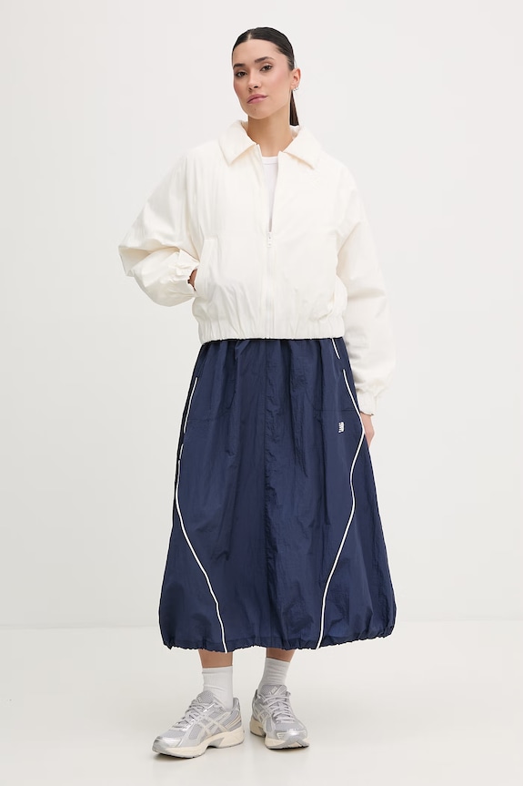 New Balance κοντό μπουφάν Γυναικείο Woven WJ61D8YXSST μπεζ SS26