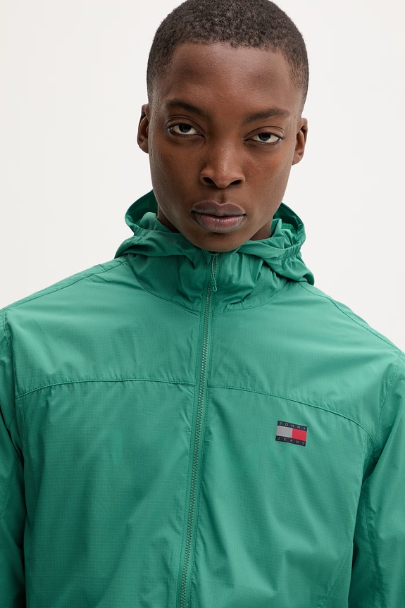 Tommy Jeans prechodná bunda pánska zelená DM0DM23112