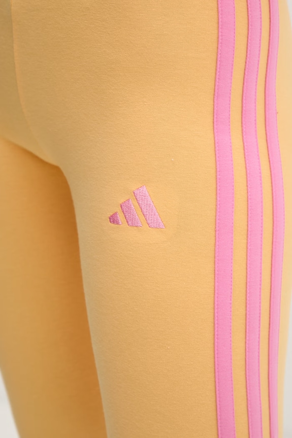 Odzież adidas legginsy KD2355 żółty