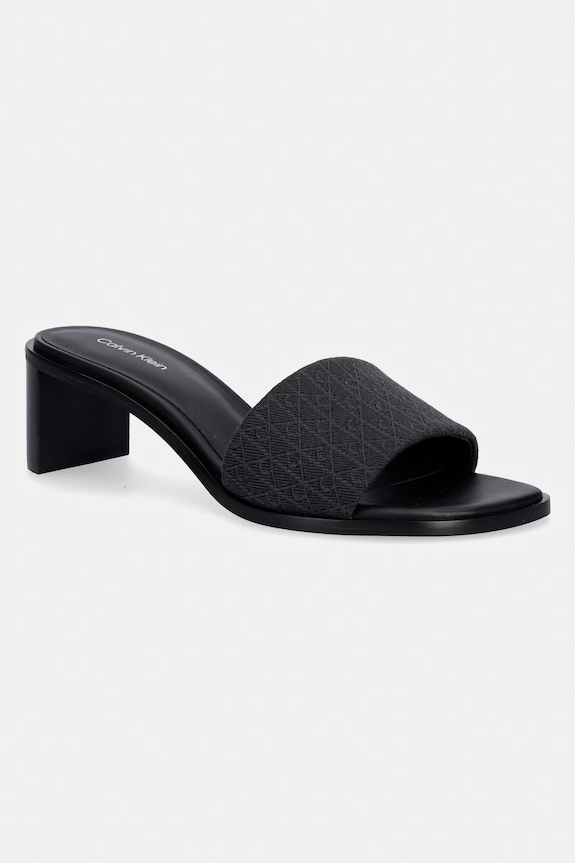 Calvin Klein σαγιονάρες στο ταχυδρομείο Γυναικείες BLOCK HEEL SANDAL AOP μαύρο HW0HW03016