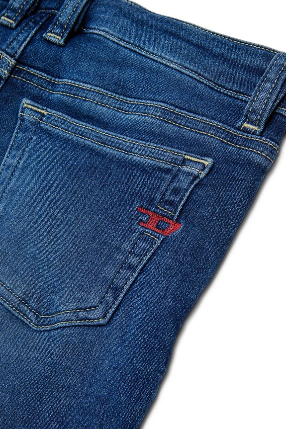 Детски дънки с памук Diesel 1979 SLEENKER-J JJJ TROUSERS син J00993.KXBR0
