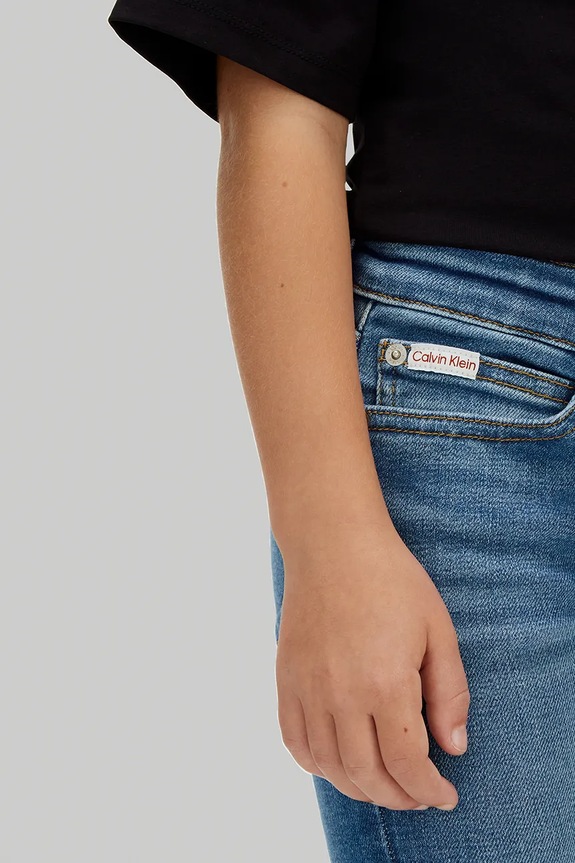 Dječje traperice Calvin Klein Jeans MR FLARE plava IG0IG03087.128.176.PPY2