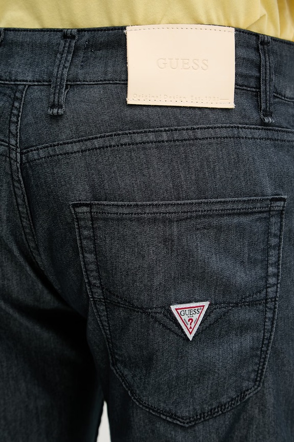 Guess nohavice slim fit pánske s bavlnou ANGELS tmavomodrá M6GAN2.W1698