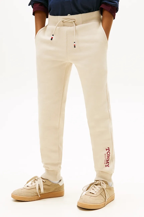 Tommy Hilfiger spodnie dresowe dziecięce dzianina beżowy KB0KB10167.104.122.PPY2