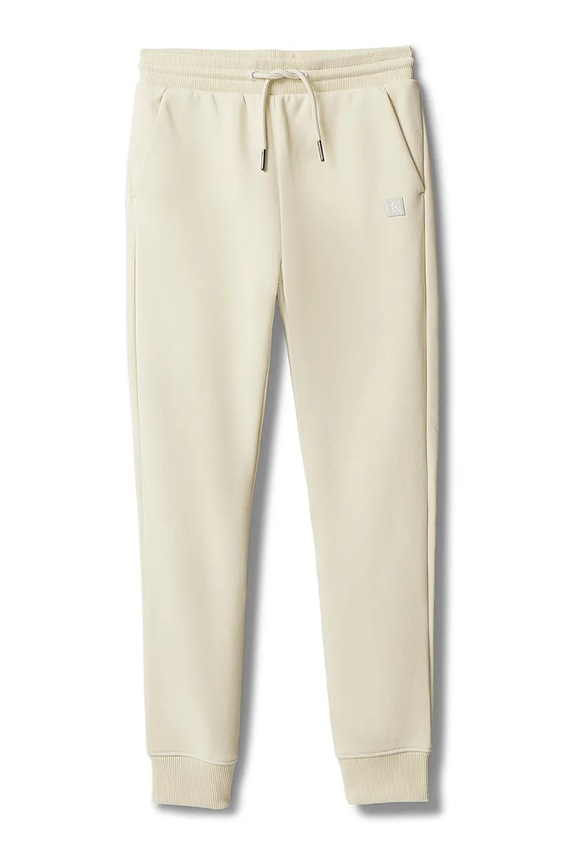 Calvin Klein Jeans spodnie dresowe dziecięce z bawełną LV1CKSJC53.128.176.PPY2 beżowy SS26