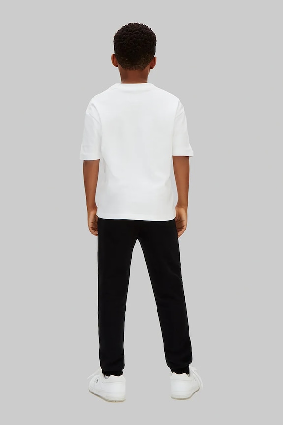 Chłopiec Calvin Klein Jeans spodnie dresowe dziecięce z bawełną LV1CKSJC53.128.176.PPY2 czarny