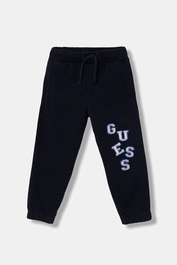 Dětské bavlněné tepláky Guess nášivka námořnická modř N6GB00.KA6R4.PPY2.M