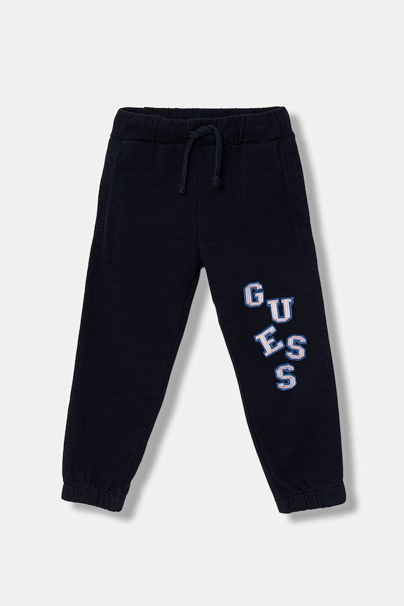 Dětské bavlněné tepláky Guess nášivka námořnická modř N6GB00.KA6R4.PPY2.M