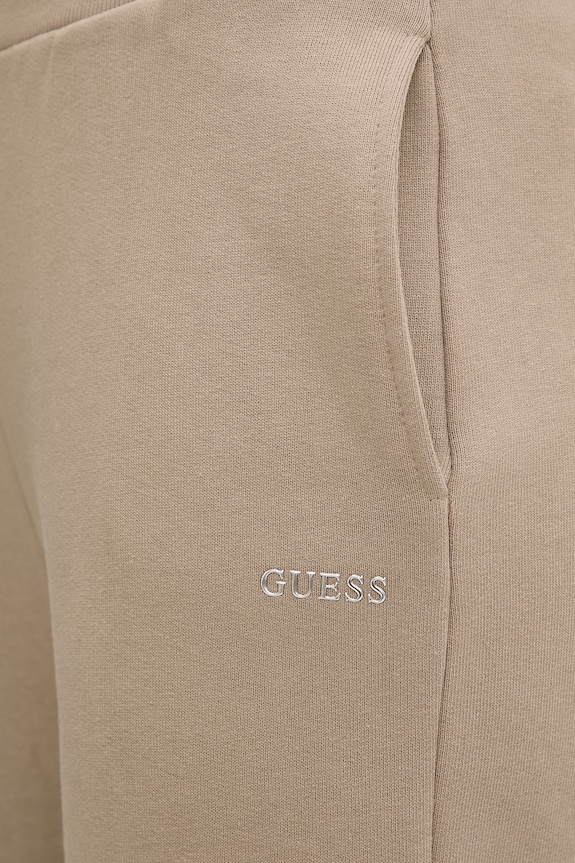 Ρούχα Παντελόνι φόρμας Guess NAT V6RB15.K9V31 μπεζ