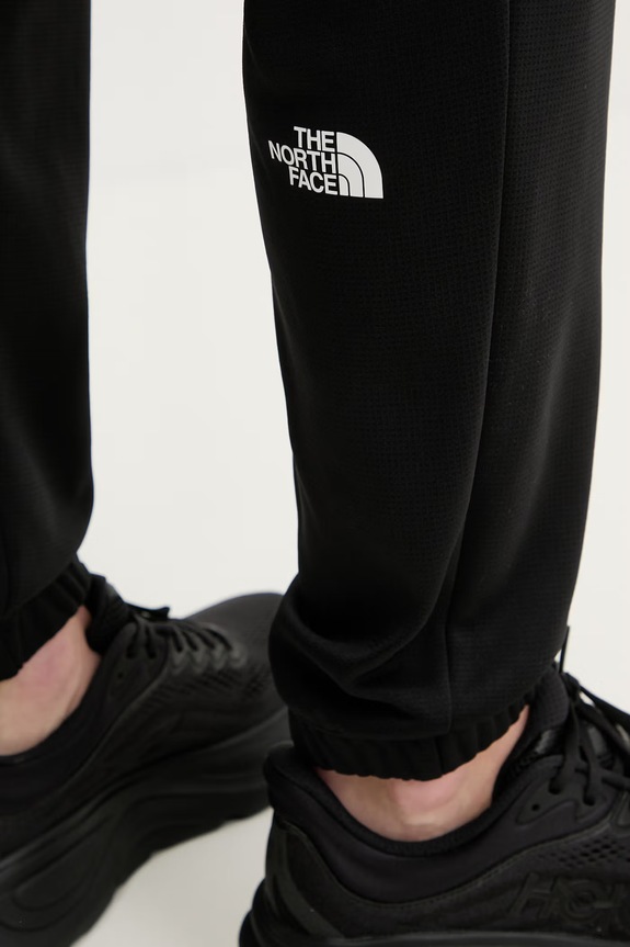 The North Face pantaloni de antrenament REAXION 2.0 negru NF0A8DWAKS71