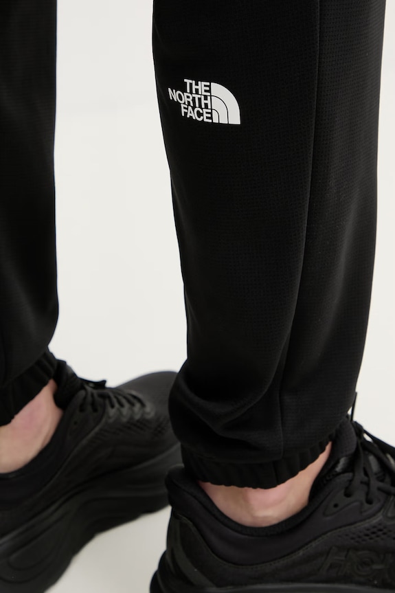 The North Face pantaloni de antrenament REAXION 2.0 negru NF0A8DWAKS71