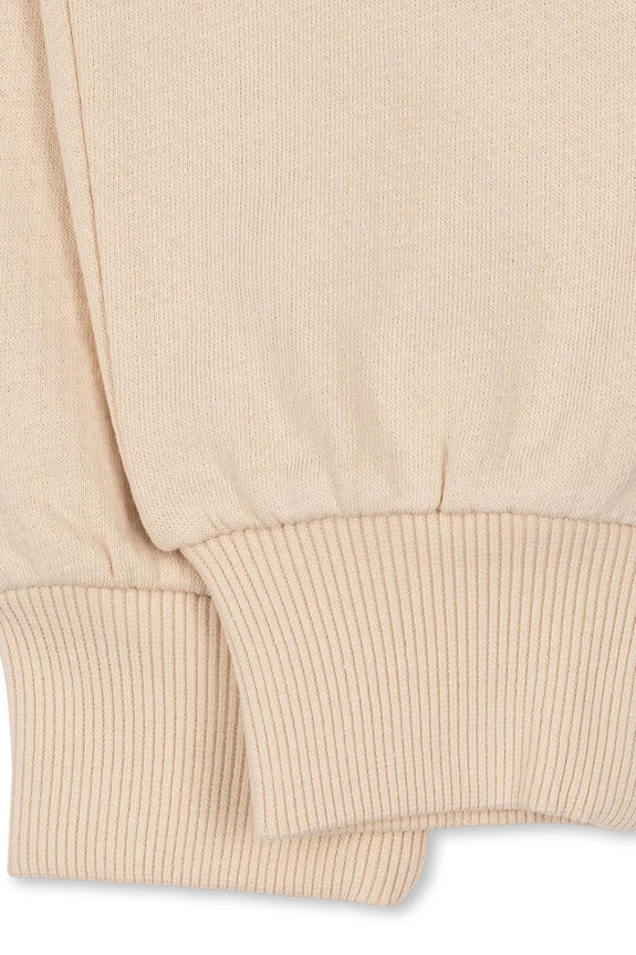 Detské bavlnené tepláky Konges Sløjd LOUPY LOU SWEAT PANTS OCS béžová KS104349.PreSpring