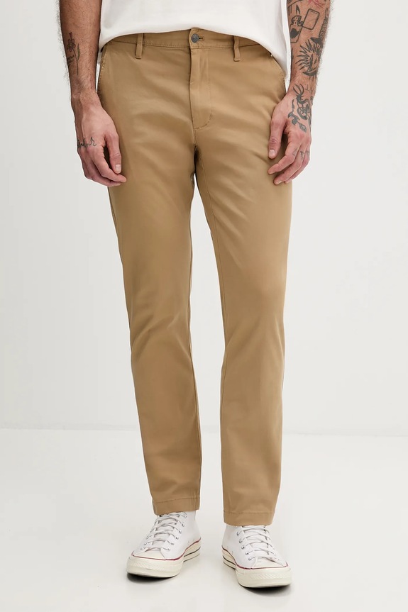 Tommy Jeans spodnie z elastanem zielony DM0DM22404