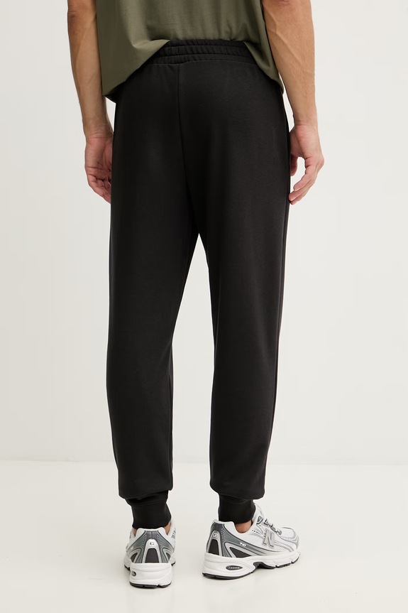 Îmbrăcăminte Puma pantaloni de trening bărbați Essential Sweatpants 682616 negru