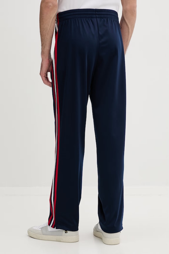 Îmbrăcăminte adidas Originals pantaloni de trening Firebird KD3830 bleumarin