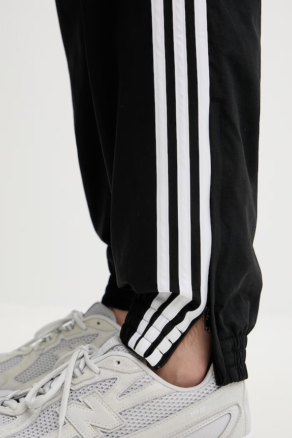 Tepláky adidas Originals Firebird černá KE1371