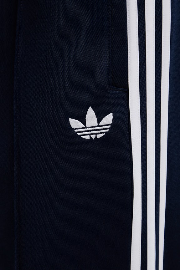 Tepláky adidas Originals námořnická modř KE3496