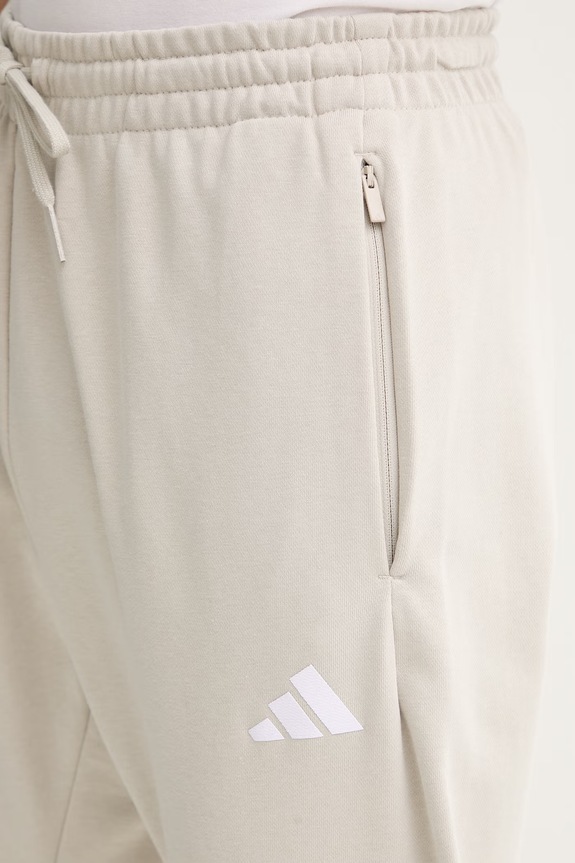 adidas spodnie dresowe beżowy KS3020