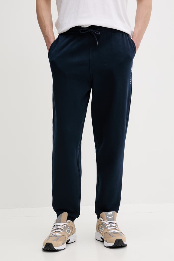Tommy Jeans pantaloni de trening bărbați cu bumbac bleumarin DM0DM23014